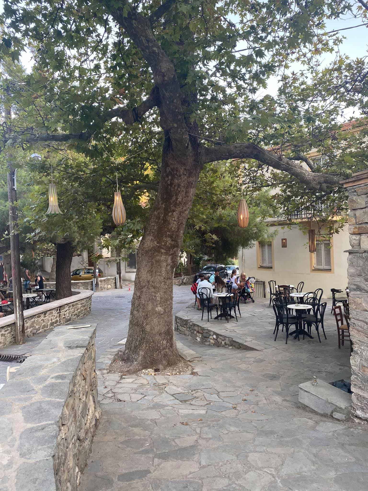 Barcarolla, JUL cocktail bar, and Platanos taverna encircle the village square