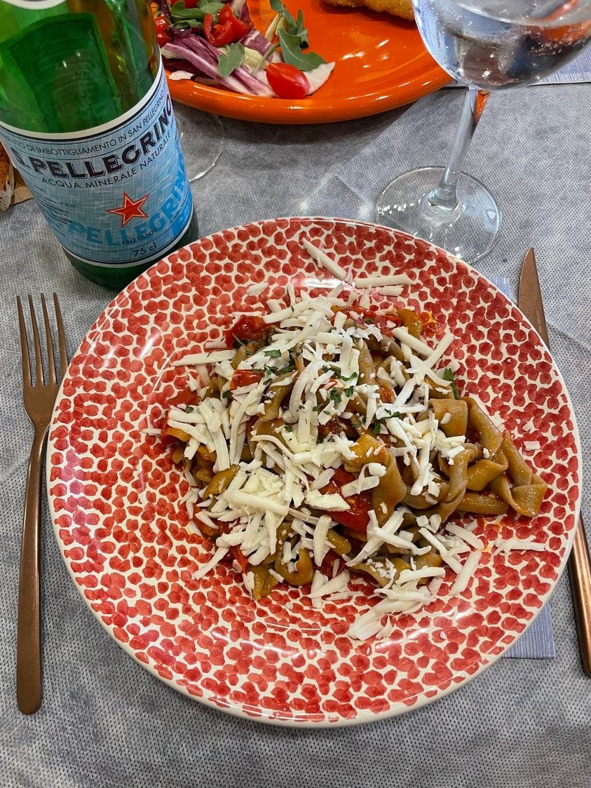 Enjoying delicious homemade pasta in Puglia