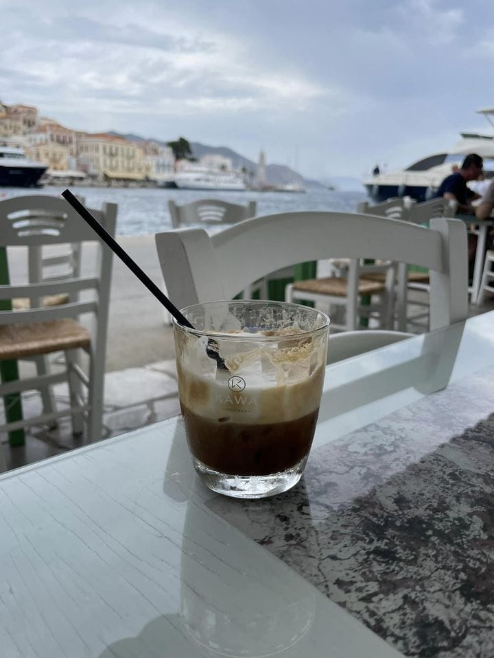 Things to do in Symi Greece: Have a coffee by the port