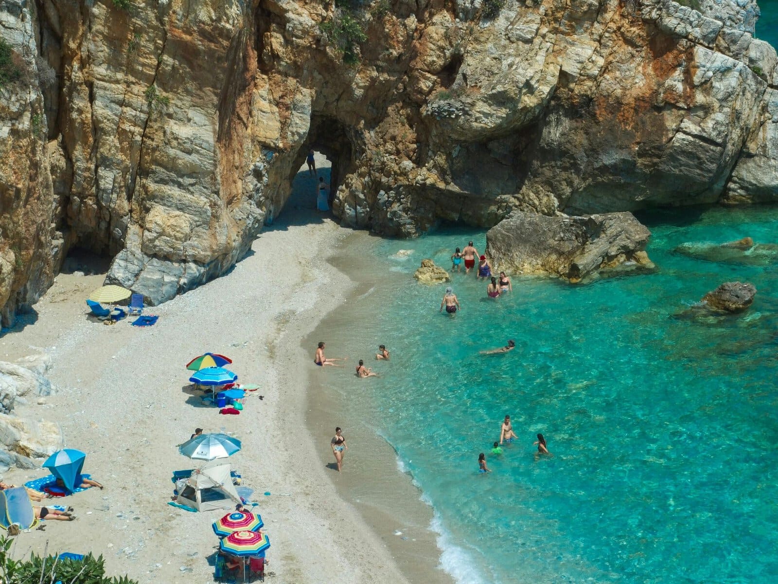 A picture of the Navarone Bay one of the best lindos greece beaches
